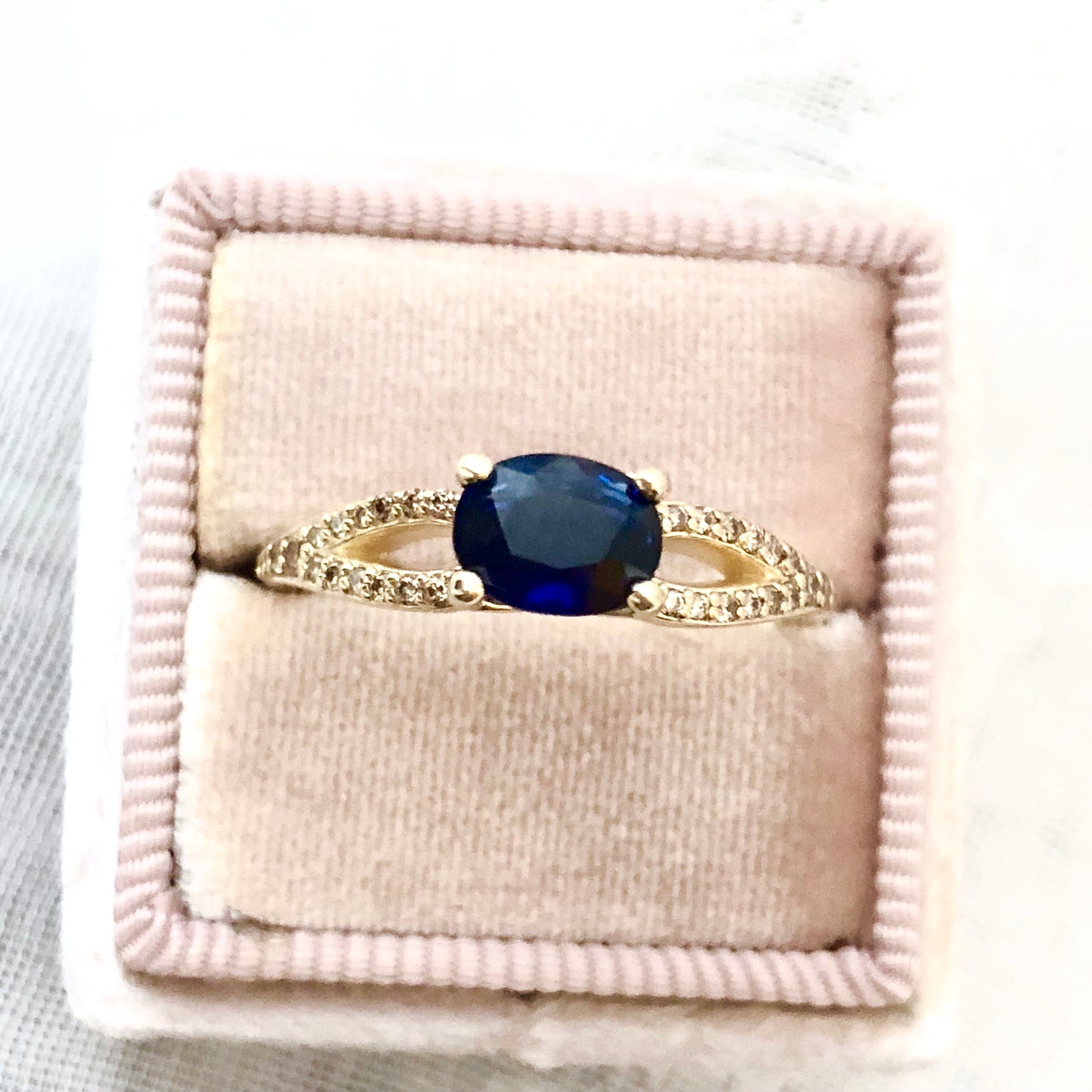 Blue Sapphire and Champagne Diamond Ring East West Setting