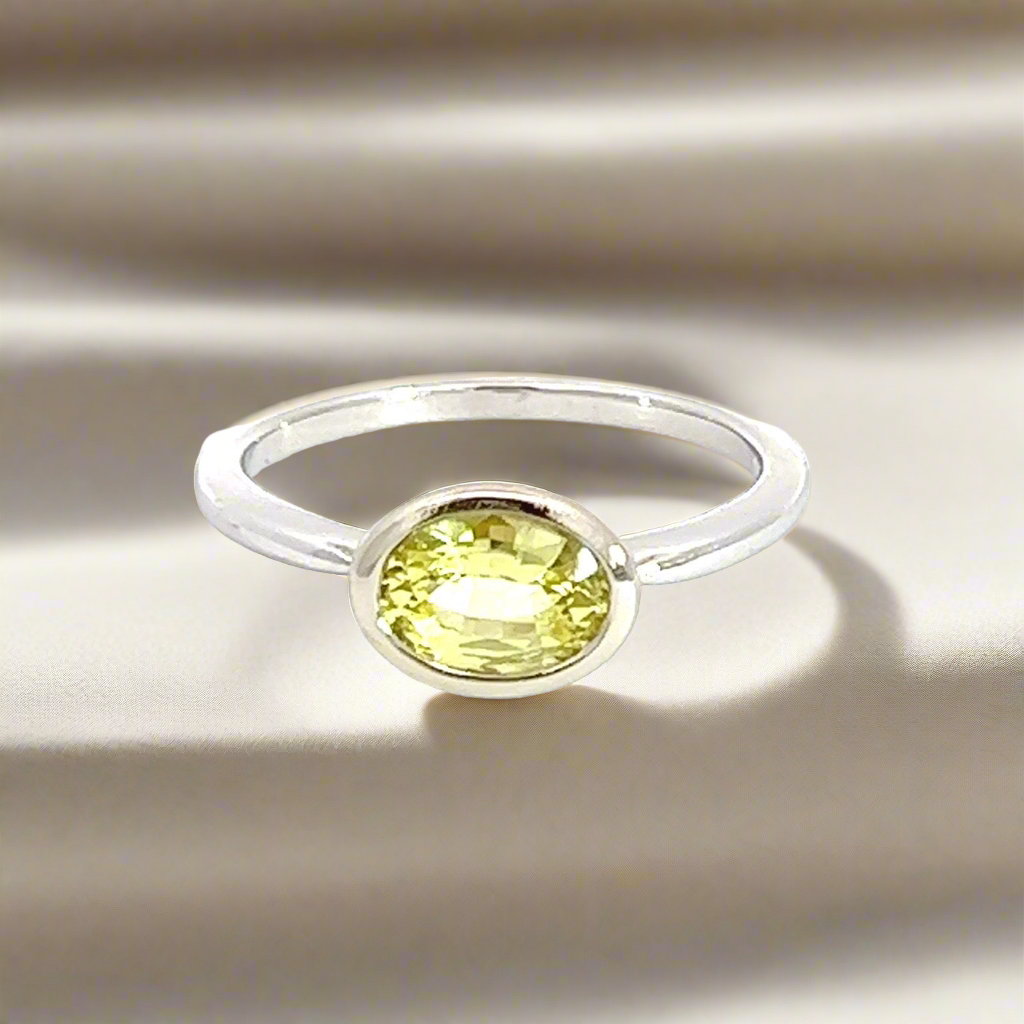 Oval Yellow Sapphire Solitaire Ring East West Set