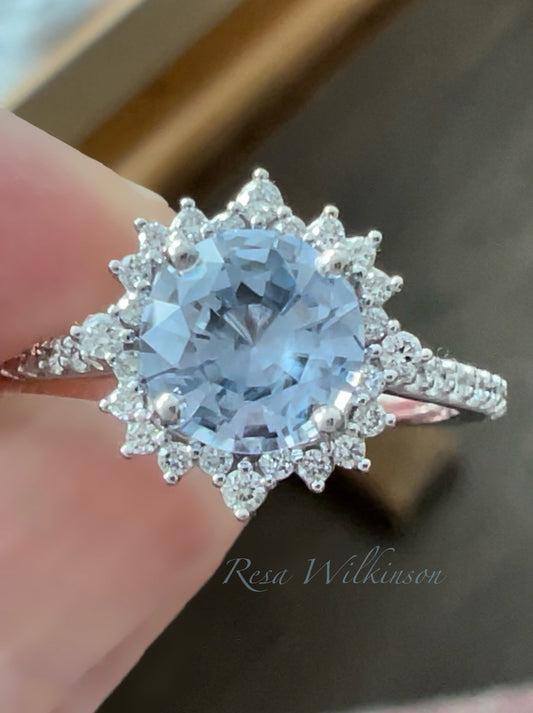 Sky Blue Sapphire and Diamond Halo Engagement Ring