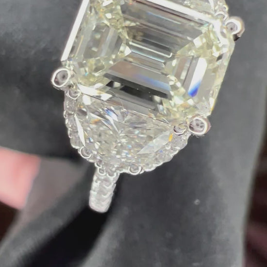 Emerald Cut and Half Moon Diamond Engagement